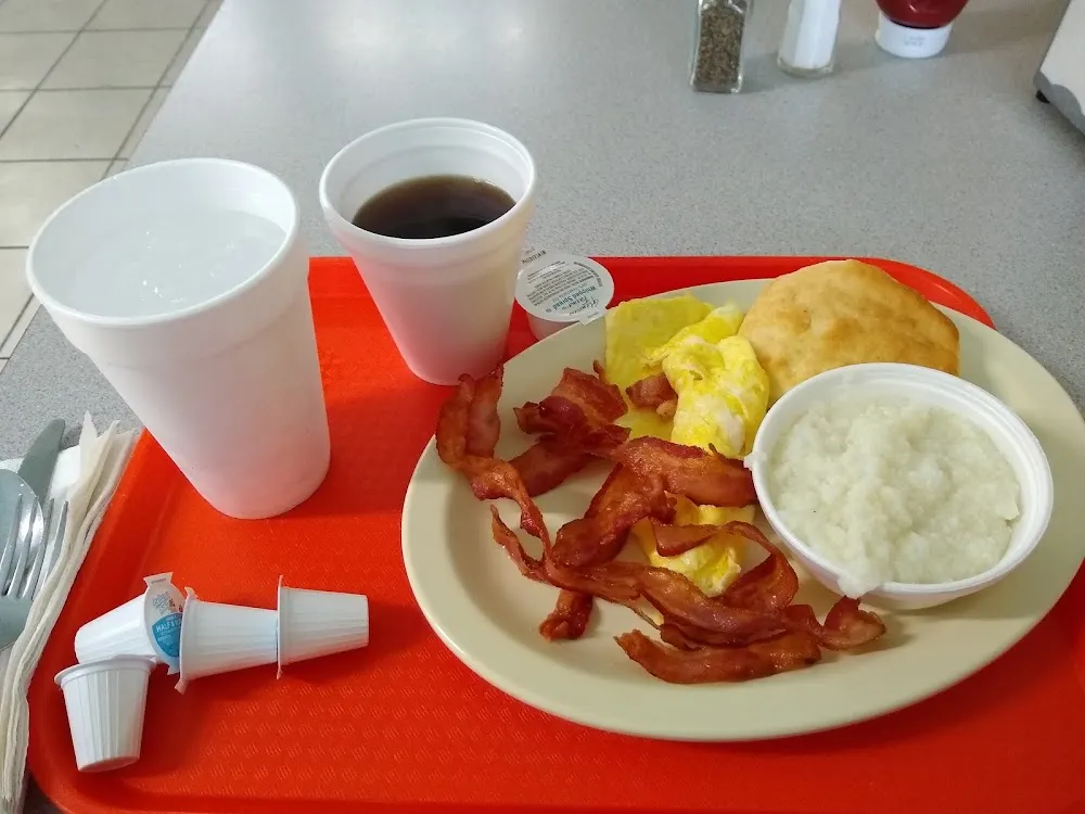 Breakfast Special Grits Eggs Bacon and Toast